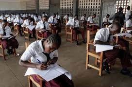 Liberian students in marron and white